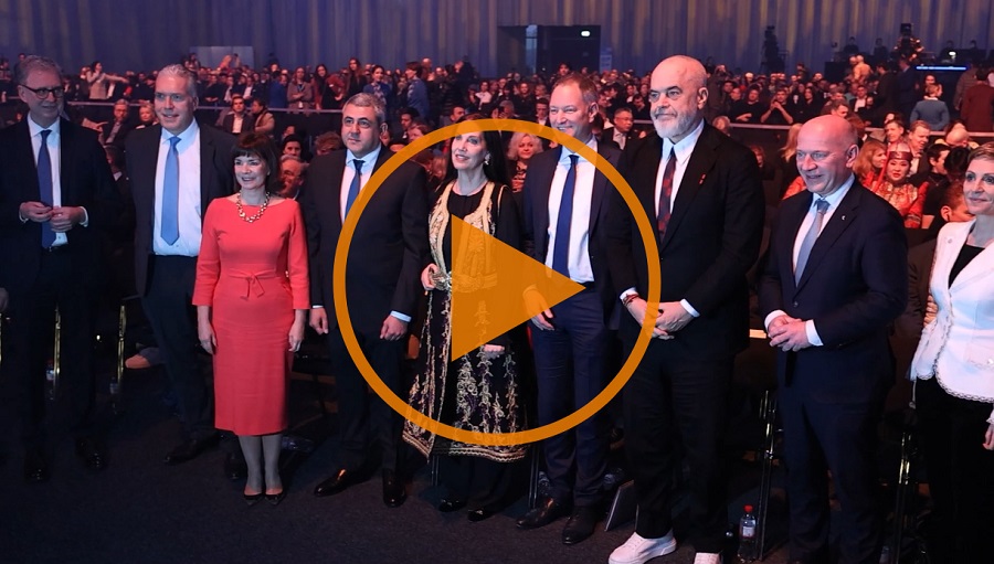 A group of elegantly dressed people at the ITB 2025 opening ceremony, surrounded by an audience in a festive hall. A group of elegantly dressed people at the ITB 2025 opening ceremony, surrounded by an audience in a festive hall.